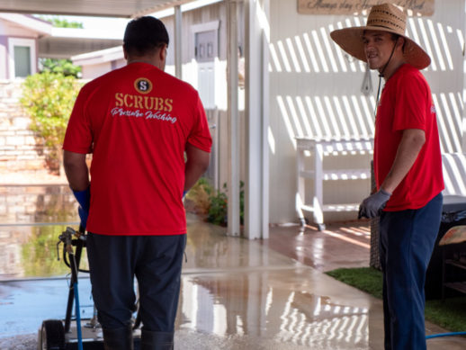 scrubs pressure washing driveway cleaning team photo